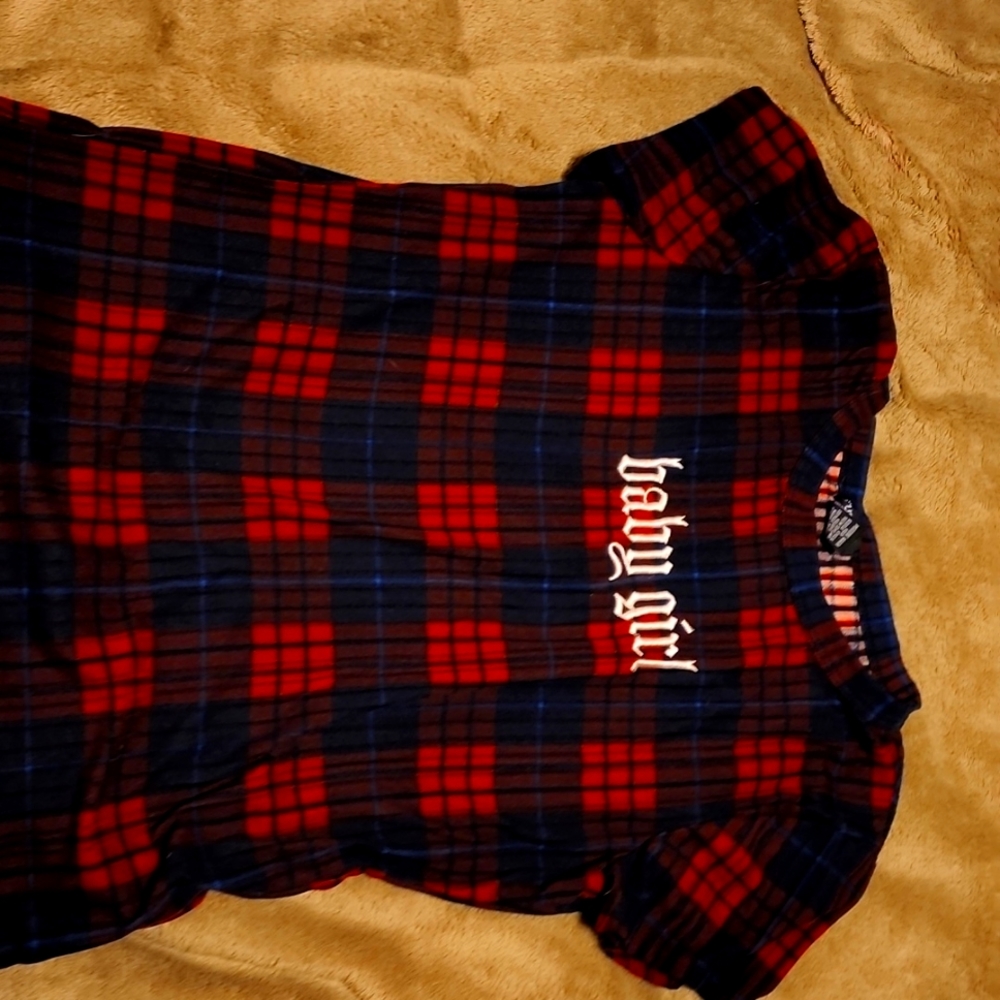 Large shirt with title "baby girl" on the front. Plain shirt -red and blue-